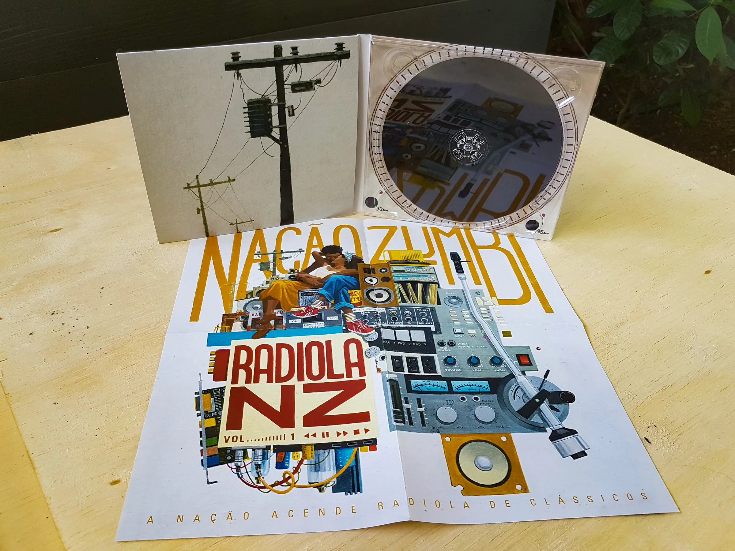 The printed CD with its fold-out poster