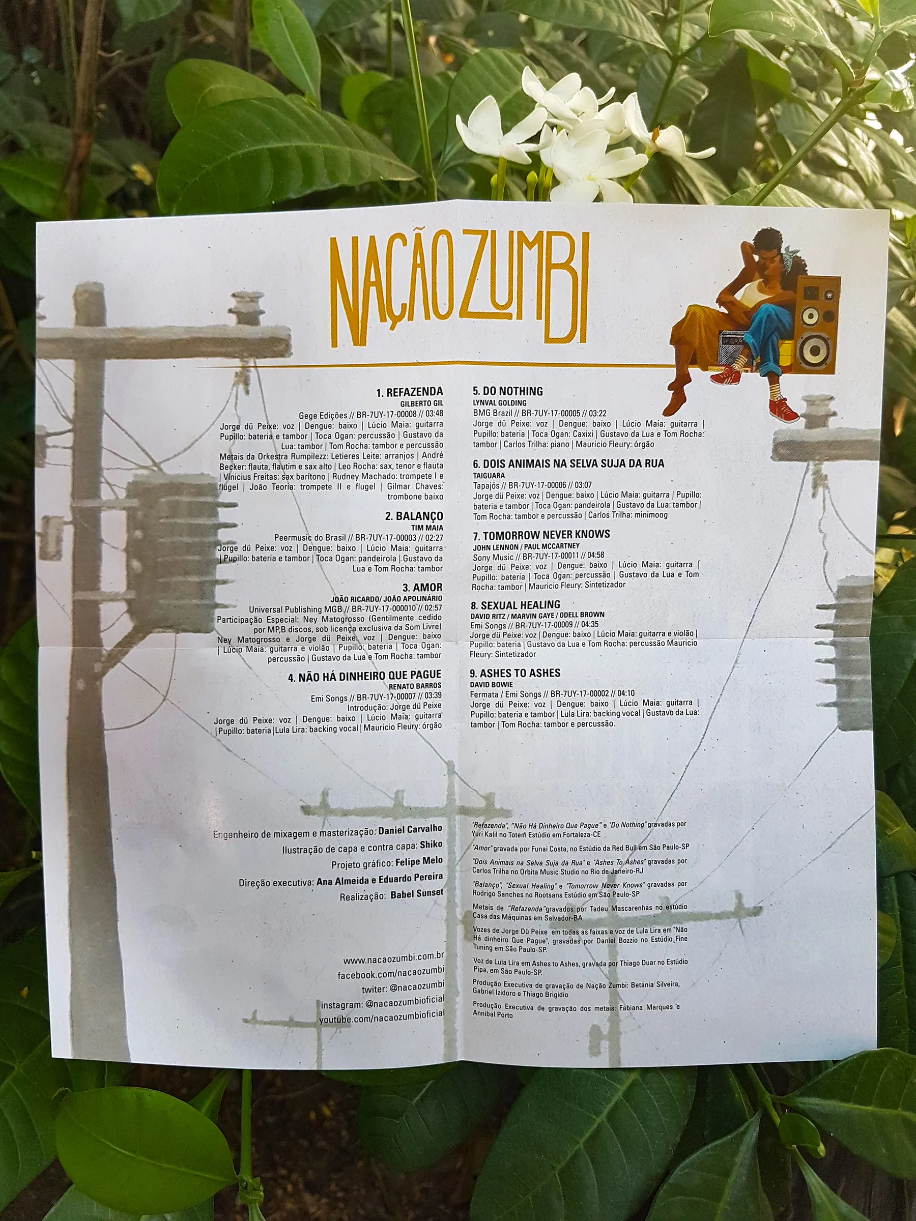 The poster, back, with the track list